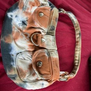 Tie dye fun 100%cotton, 2 front small pockets snaps. Like new